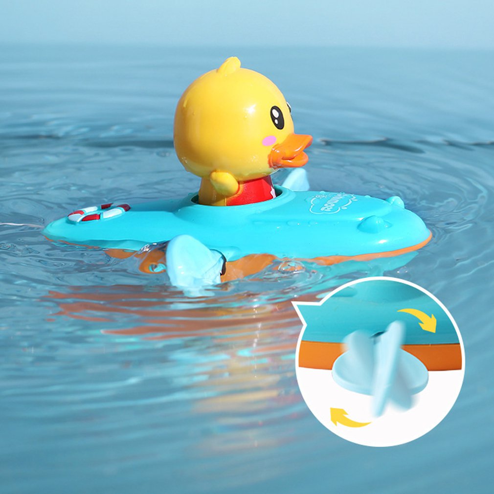 water-playing-toys-rowing-boat-floating-cartoon-duck-magical-little-minds